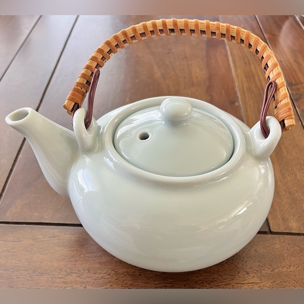 Elegant Ceramic Teapot with Woven Handle